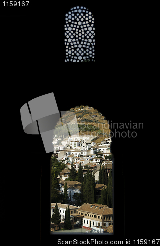 Image of View of Granada through the typical Moorish windows of the Nasri