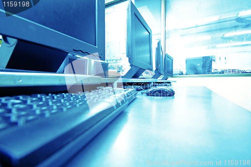 Image of workplace room with computers