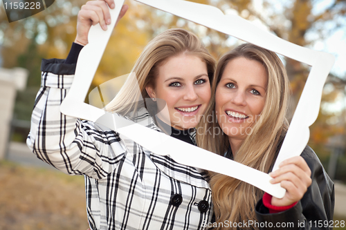 Image of Pretty Mother and Daughter Portrait in Park with Frame