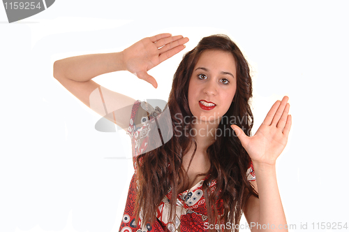 Image of Girl giving sign.