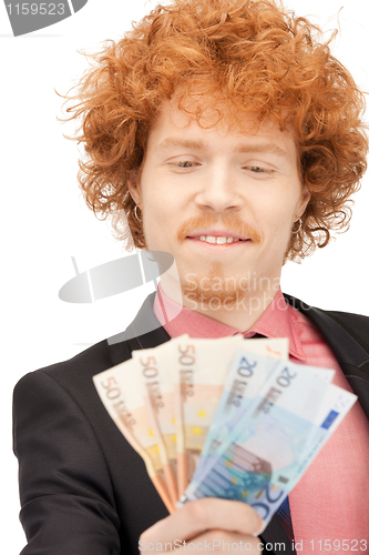 Image of handsome man with euro cash money