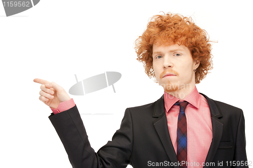 Image of businessman pointing his finger