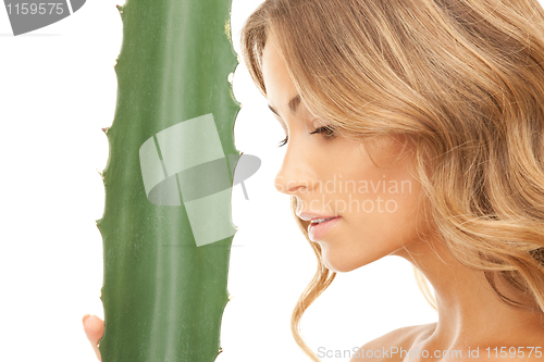 Image of lovely woman with aloe vera