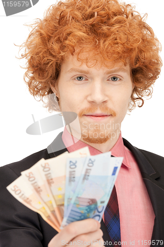 Image of handsome man with euro cash money