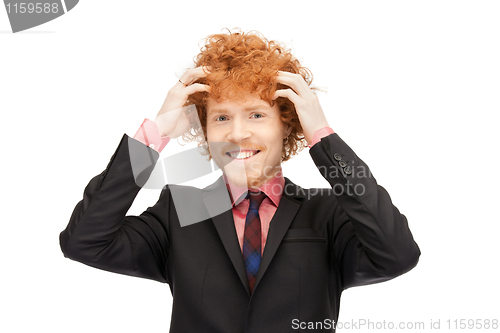 Image of handsome man with expression of tryumph
