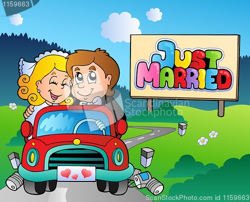 Image of Just married couple driving car