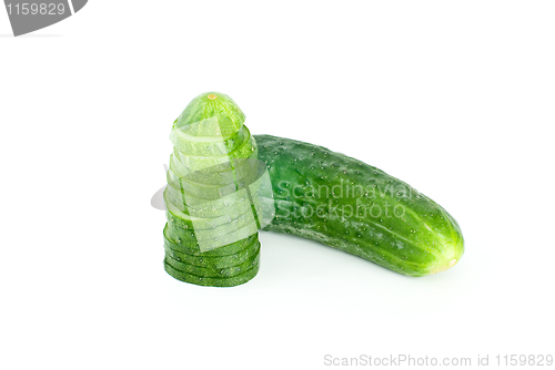 Image of Whole cucumber and few slices 
