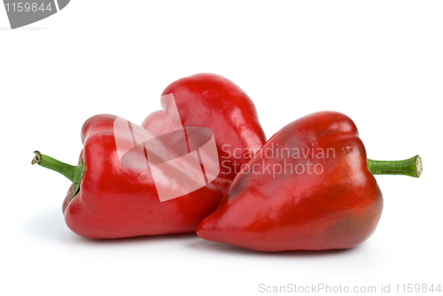 Image of Three red sweet peppers