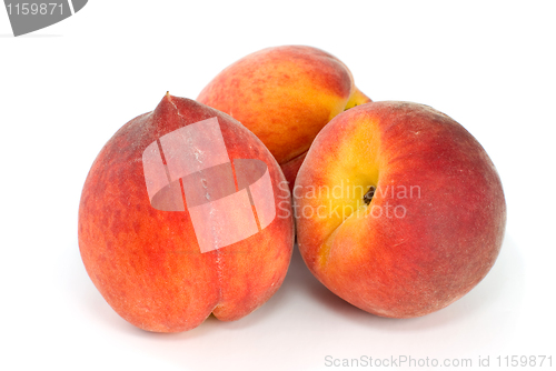 Image of Three tasty peaches