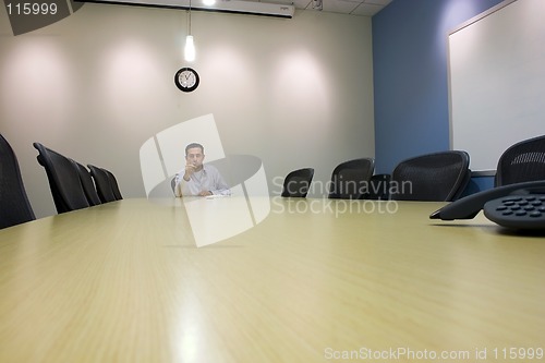 Image of Businessman in a Conference Room