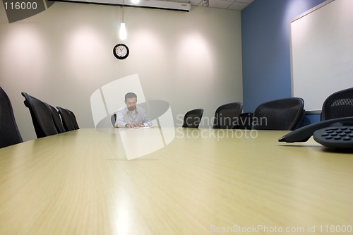 Image of Businessman in a Conference Room