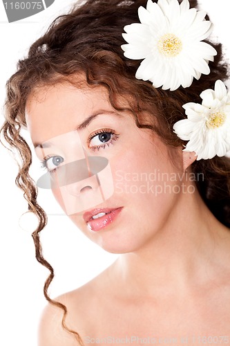 Image of pretty woman with flower