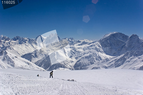 Image of snowboarder in the mountains