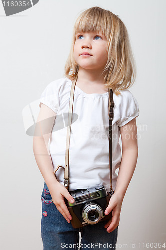 Image of Little girl with camera