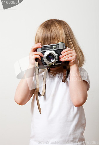 Image of Little girl with camera