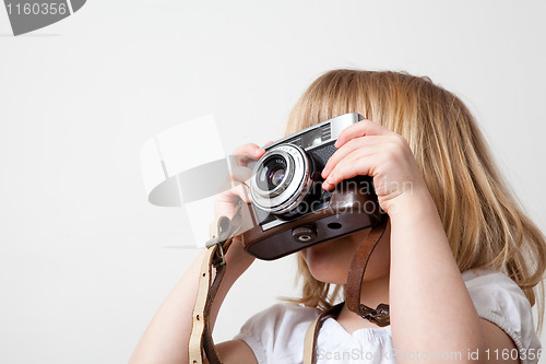 Image of Little girl with camera