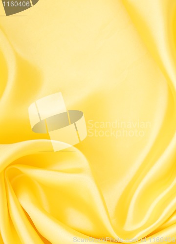 Image of Smooth elegant golden silk as background 