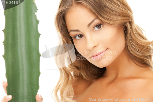 Image of lovely woman with aloe vera