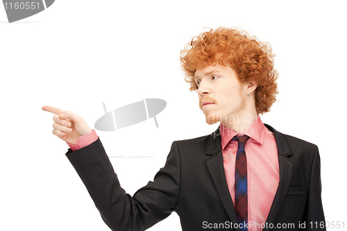 Image of businessman pointing his finger