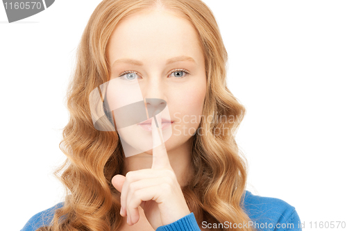 Image of finger on lips