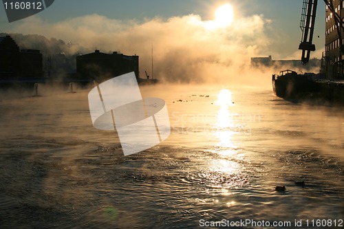 Image of Morning in the foggy city.