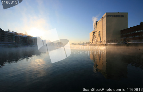 Image of Morning in the foggy city.