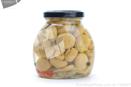 Image of Glass jar with marinated champignons