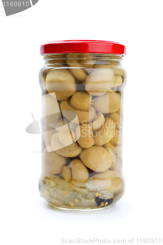 Image of Glass jar with marinated champignons