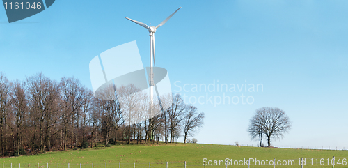 Image of Countryside landscape with wind turbine