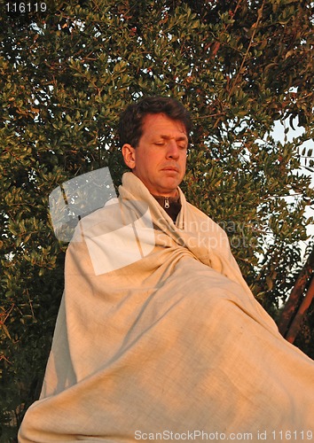 Image of Meditating at Sunset