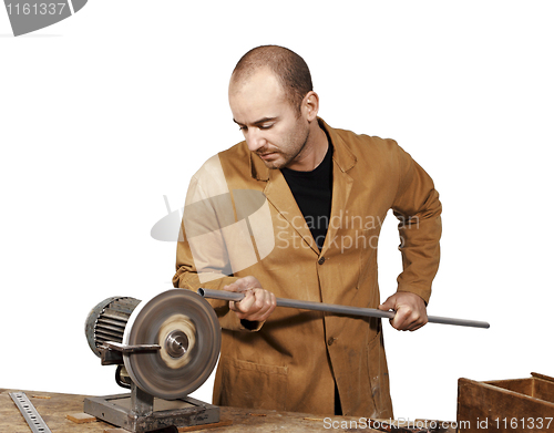 Image of craftsman work at grinder
