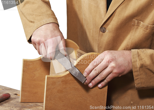 Image of carpenter at work detail