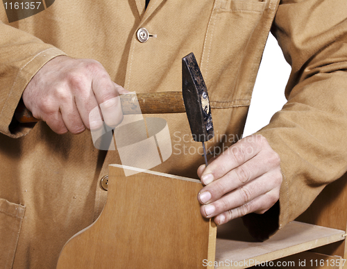Image of carpenter at work detail