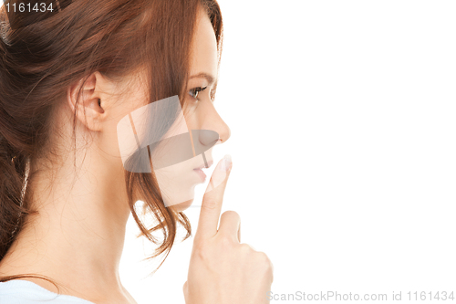 Image of finger on lips