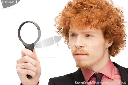 Image of man with magnifying glass