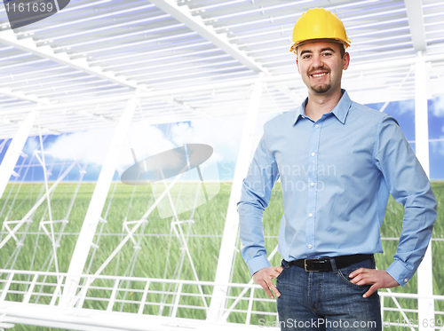 Image of modern eco building and engineer