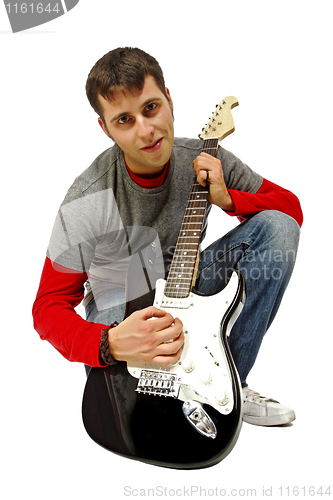 Image of young man with guitar