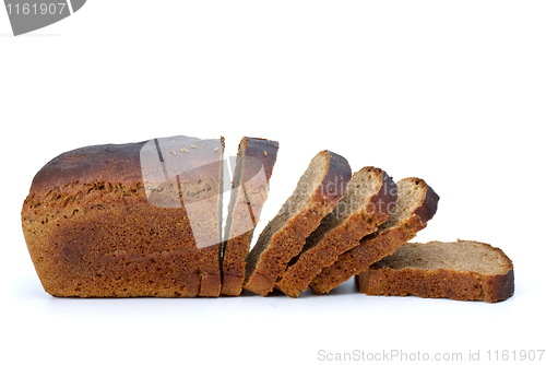 Image of Chunk of rye bread with anise and some slices