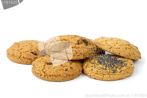 Image of Few oatmeal cookies (with raisins, sesame and poppy seeds) isolated on the white background