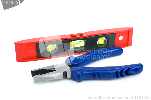 Image of Bubble level tool and pliers