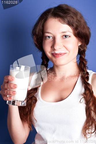 Image of woman drinking milk