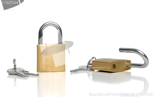 Image of Two security gold locks and keys