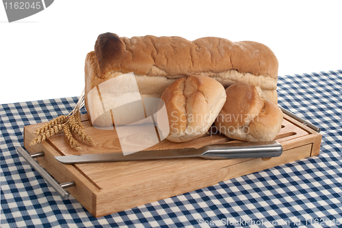 Image of Slices of bread on top of wooden board