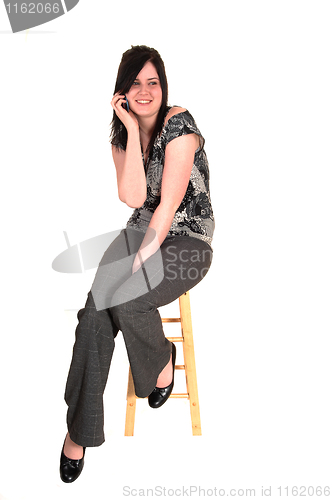 Image of Businesswoman sitting.