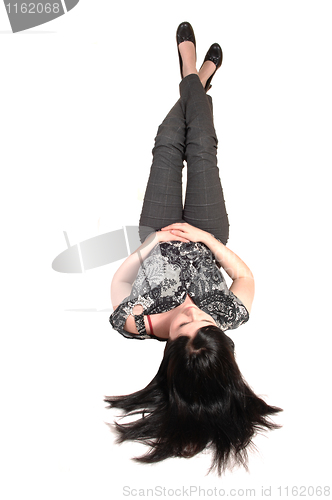 Image of Girl lying on back.