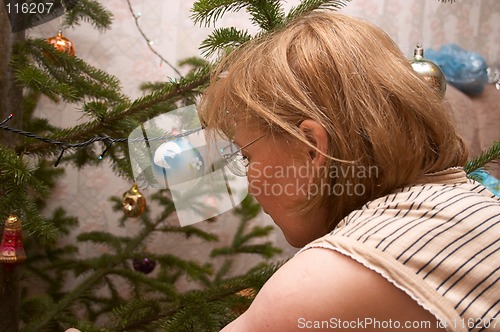 Image of Decorating of Christmas tree