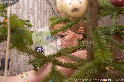 Image of Decorating of Christmas tree