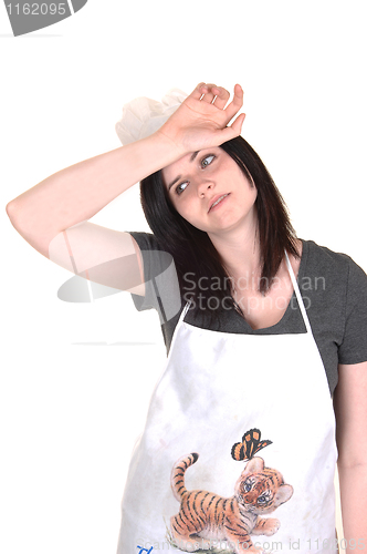 Image of Exhausted cooking girl.