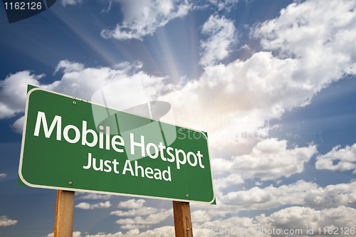Image of Mobile Hotspot Green Road Sign and Clouds