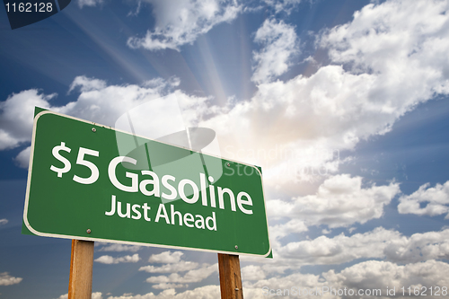 Image of $5 Gasoline Green Road Sign and Clouds